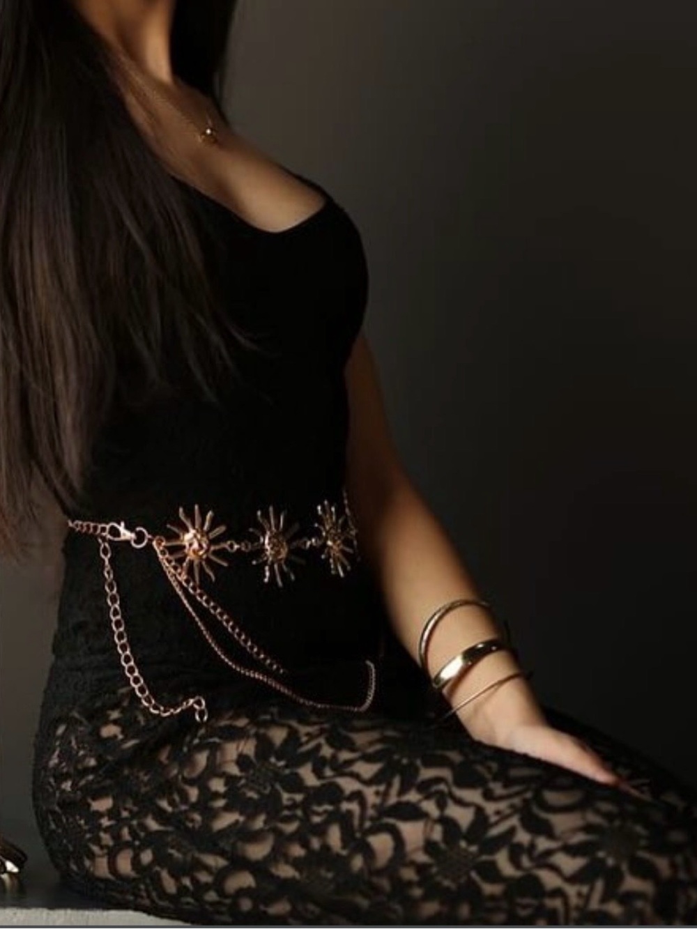 Black lace jumpsuit with sunburst embellishments #lace #sunburst